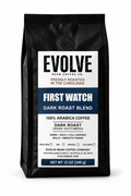 A 12 oz bag of Evolve Bean Coffee Company's First Watch Dark Roast Blend, shown against a plain white background.